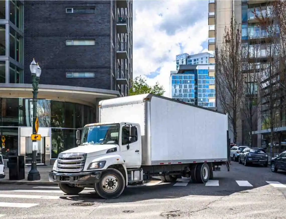 18 wheeler truck driving around the city