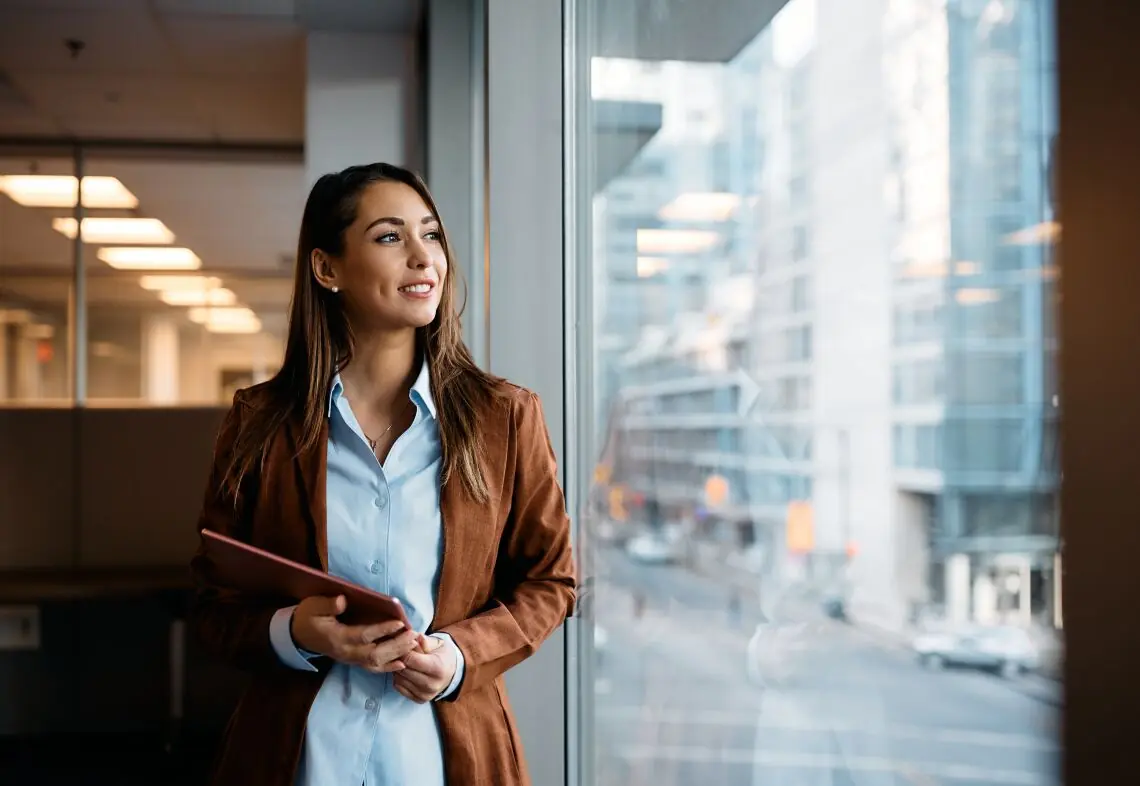worker looking out office window