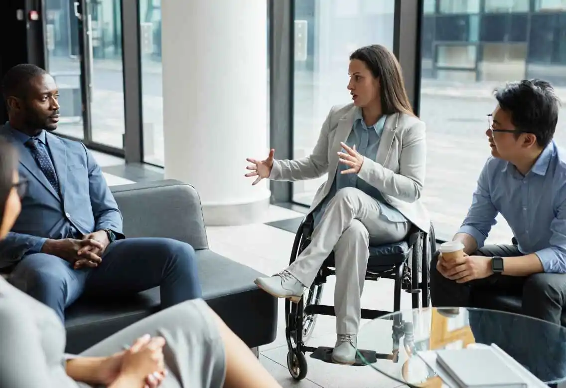 co-workers discussing business and insurance