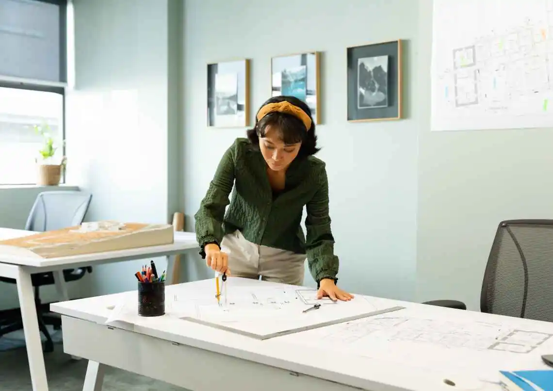 architect coming up with building plans