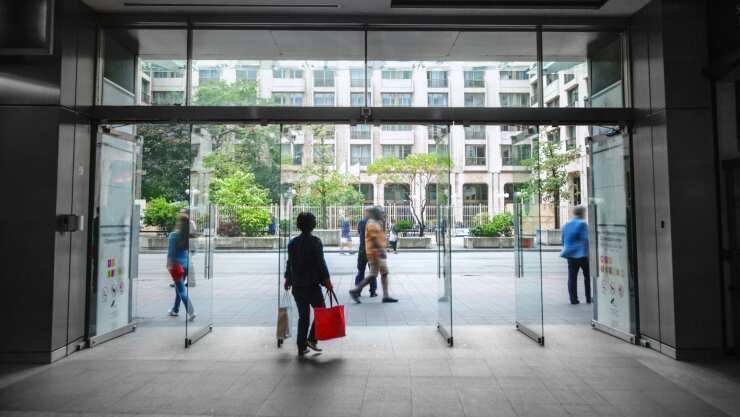 woman-leavinng-office-building