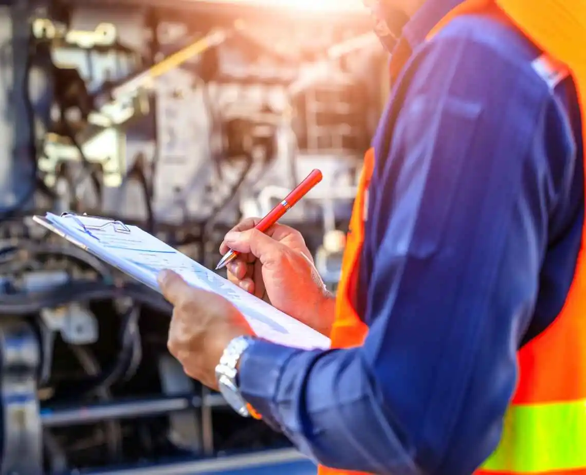 construction worker or project manager taking notes
