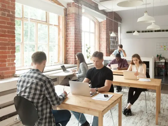 several insurance employees working at their office