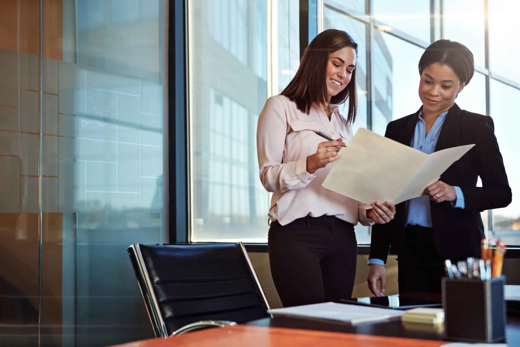 employee benefits atorney meeting with a client to go over compliance and client solutions