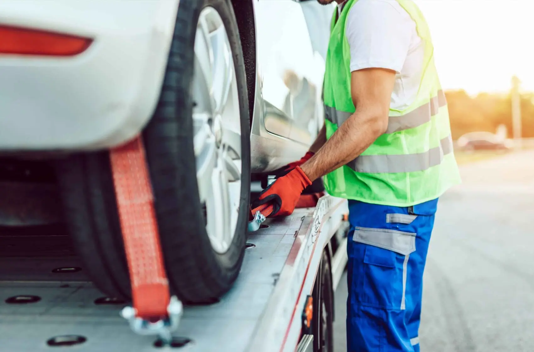 car being attached to tow and insurance offer